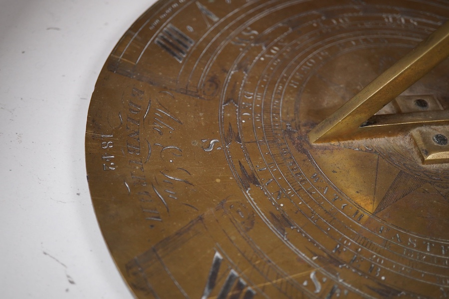 An early Victorian Adie & Son bronze sun dial, engraved; Edinburgh 1842, 32cm diameter, 19cm to end of gnomon. Condition - fair to good.